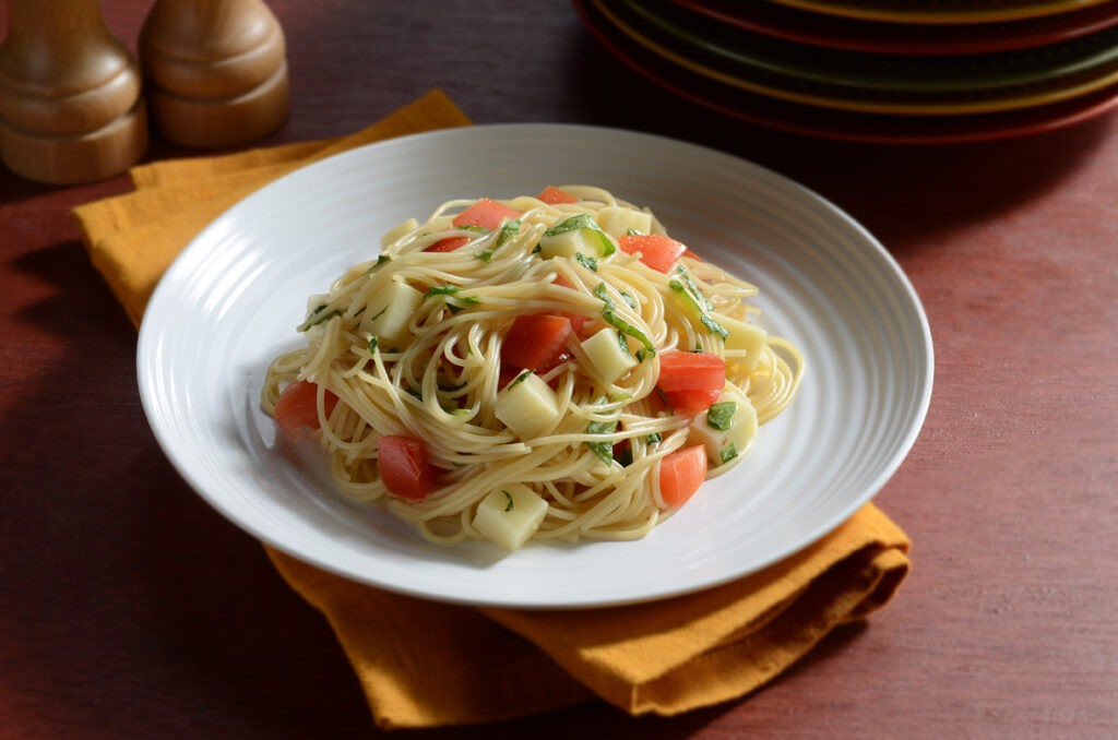 Angel Hair Caprese with angel hair pasta, tomatoes and fresh mozzarella