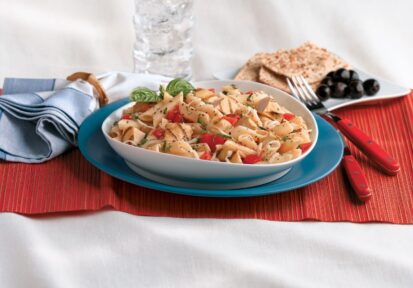 Penne with grilled chicken and caprese flavors of mozzarella, fresh basil, and diced tomatoes