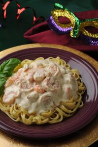 Creole seafood fettuccini with shrimp and Cajun seasoning in a cream sauce