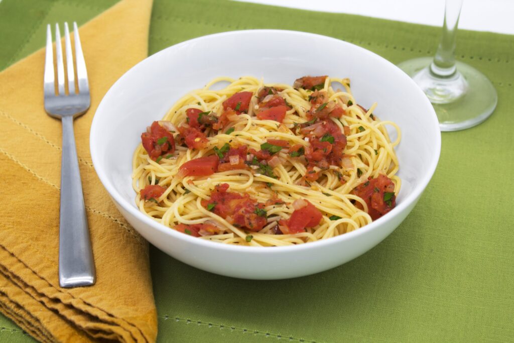 Angel hair marinara with tomatoes, garlic, basil, and fresh parsley